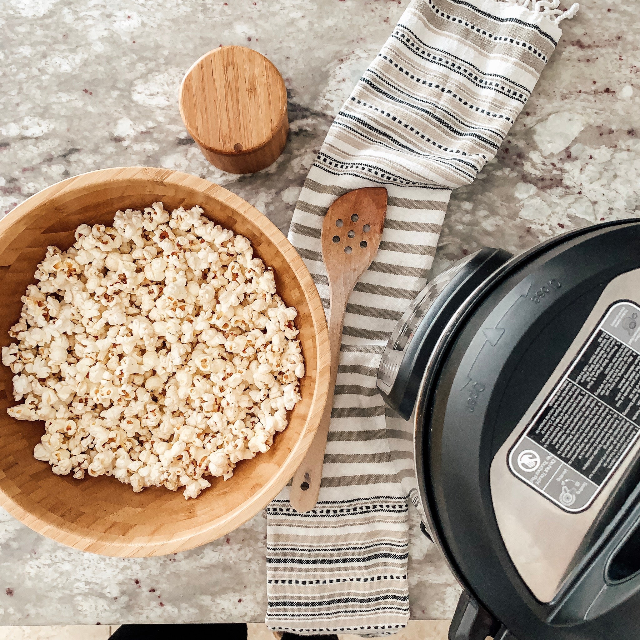 Instant Pot popcorn in a wood bowl