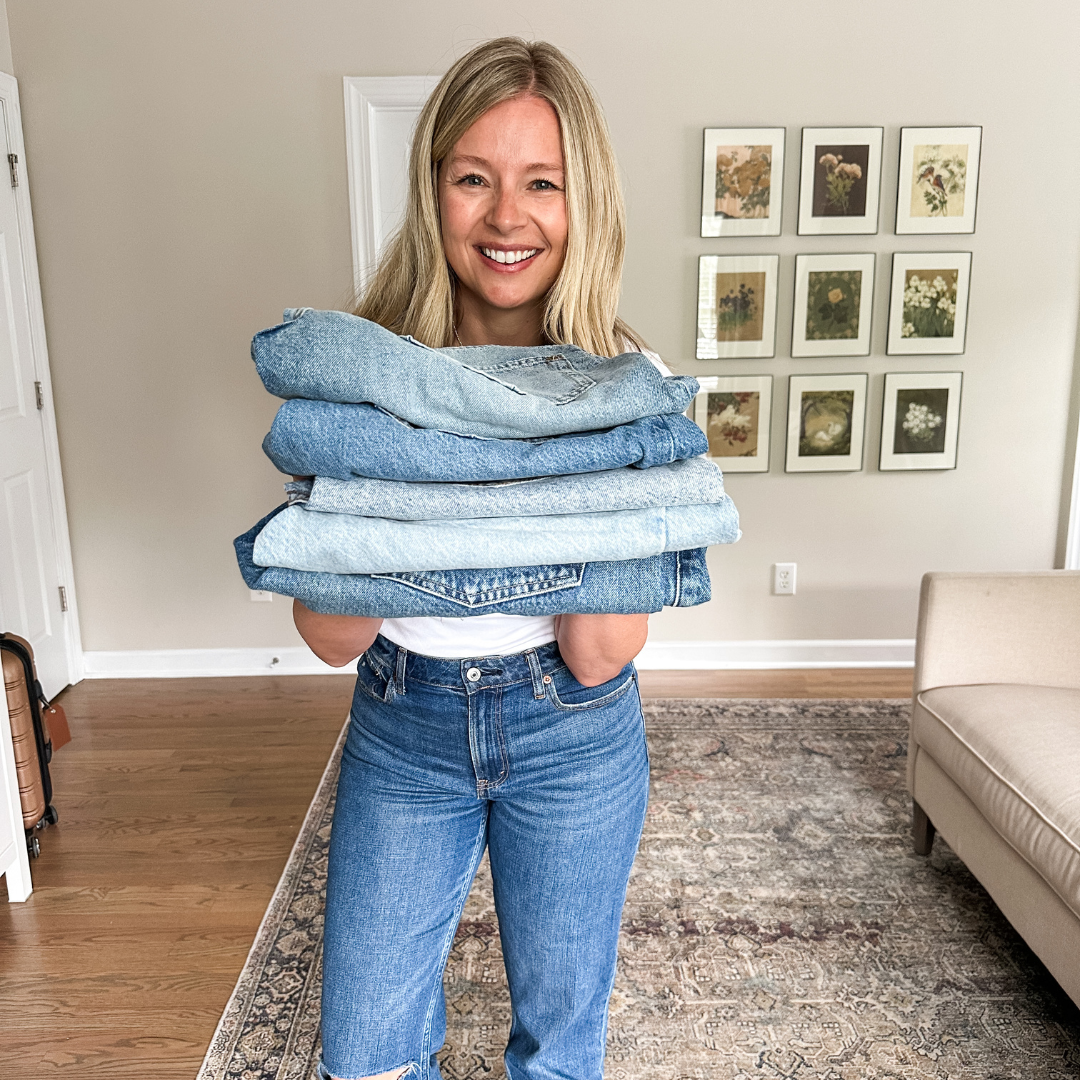 Brittney holding folded shorts