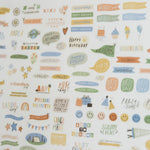 Close-up of colorful calendar stickers for birthdays, holidays, and appointments