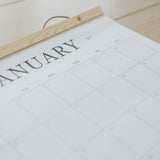 January page of the large wall calendar with its cedar wood hanger