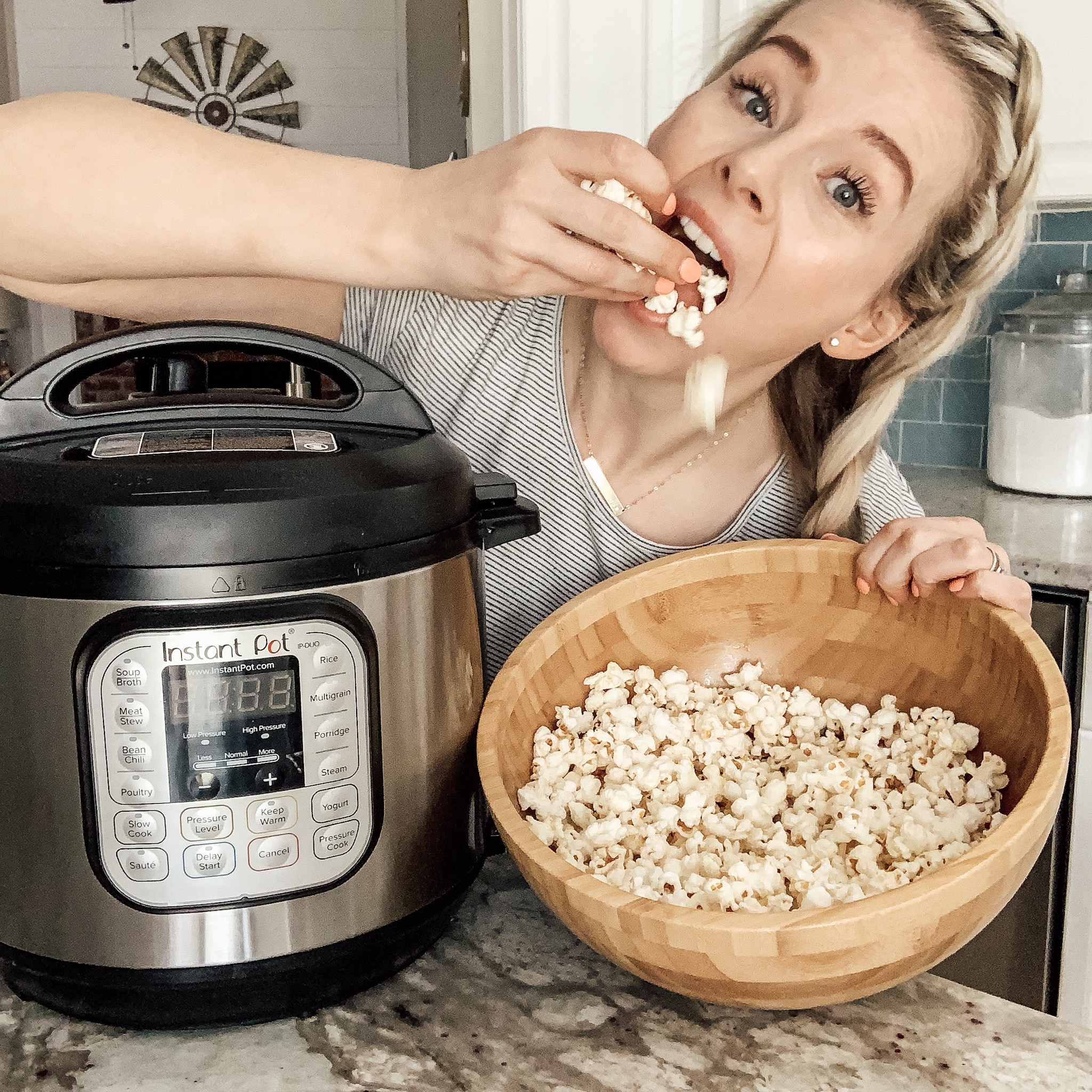 Eating popcorn from a wooden bowl with Instant Pot