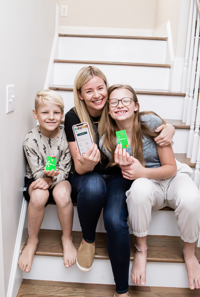 Brittney with her kids and Greenlight Money Management System