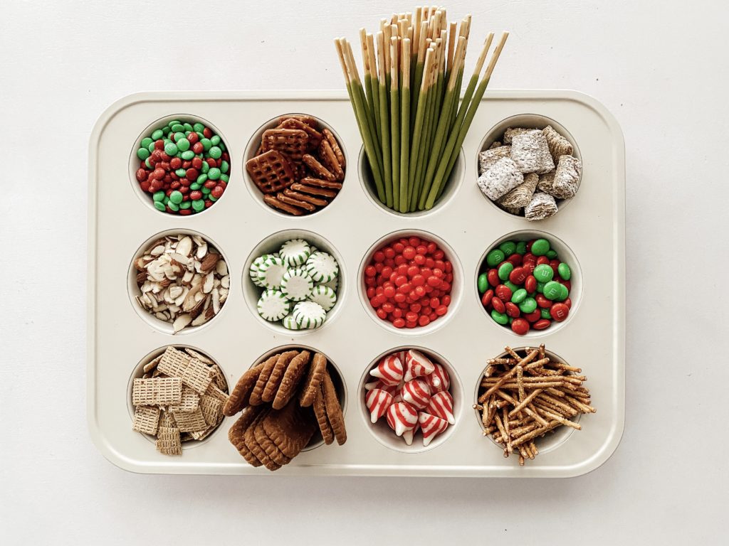 1. Prepare candy decorations in a muffin tin.