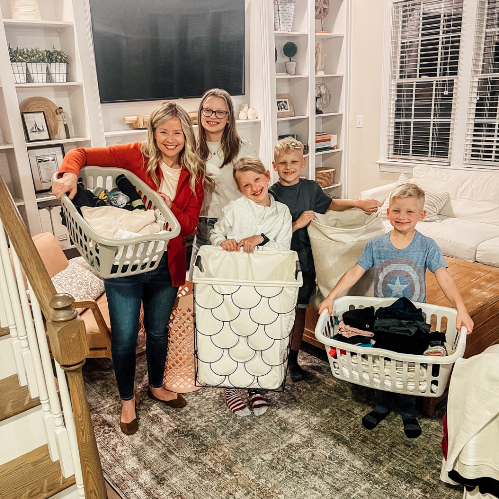 Our family holding laundry baskets