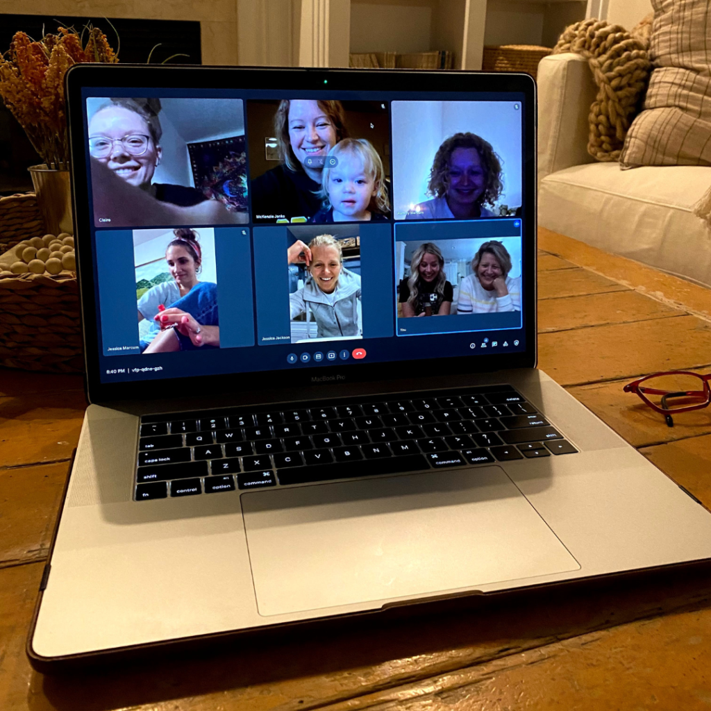 Laptop with virtual book club meeting on the screen